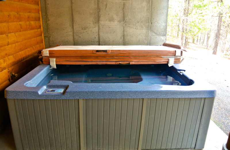 Private patio and hot tub from the cabins at Sawtelle Mountain Resort.