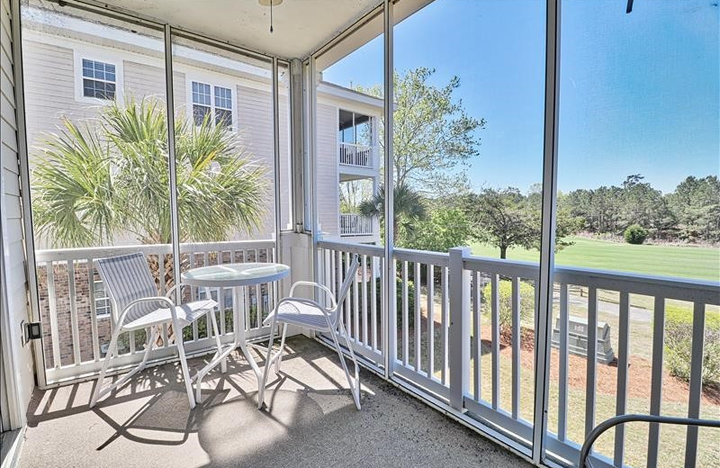 Rental balcony at Barefoot Resort Rentals.