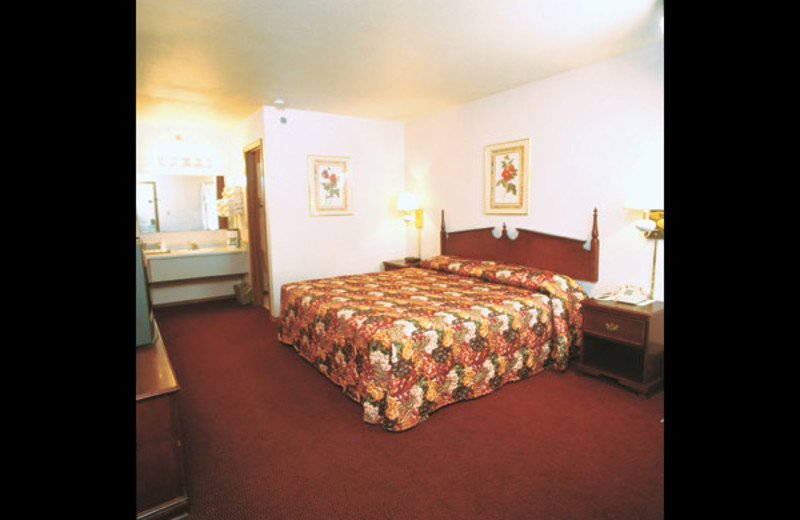 Guest room at Honeysuckle Inn & Conference Center.