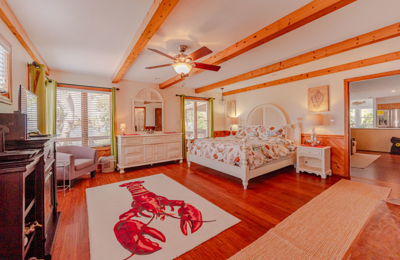 Rental bedroom at Joe Lamb Jr. & Associates Vacation Rentals.