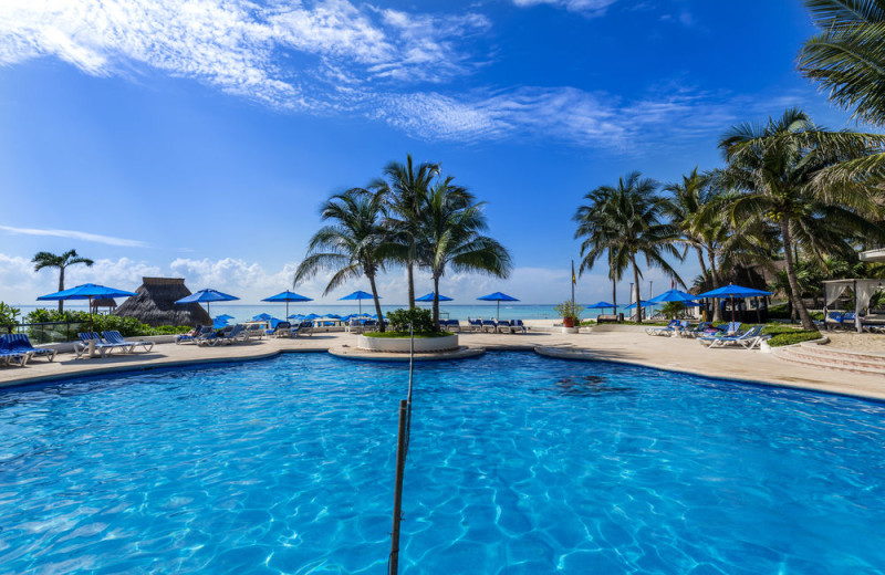 Outdoor pool at Reef Club Playacar.