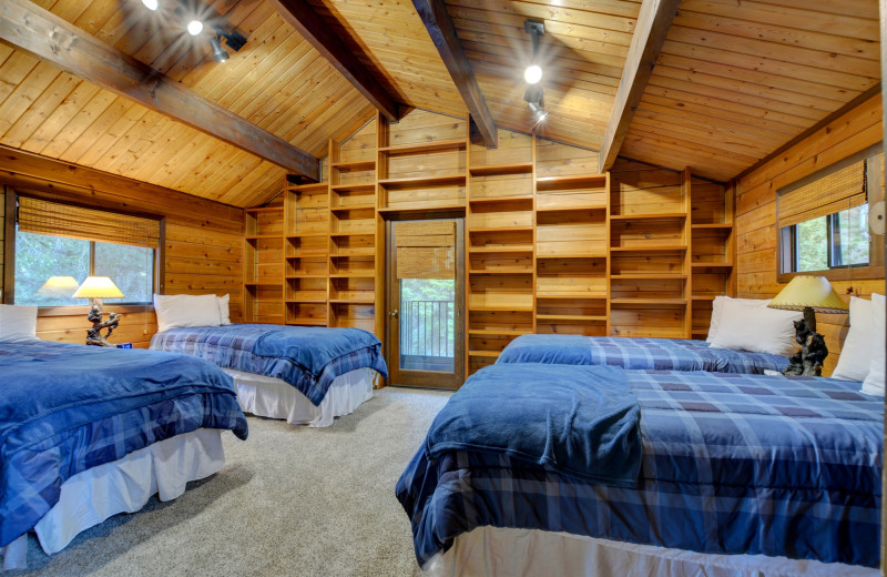 Cabin bedroom at Morrison's Rogue River Lodge.