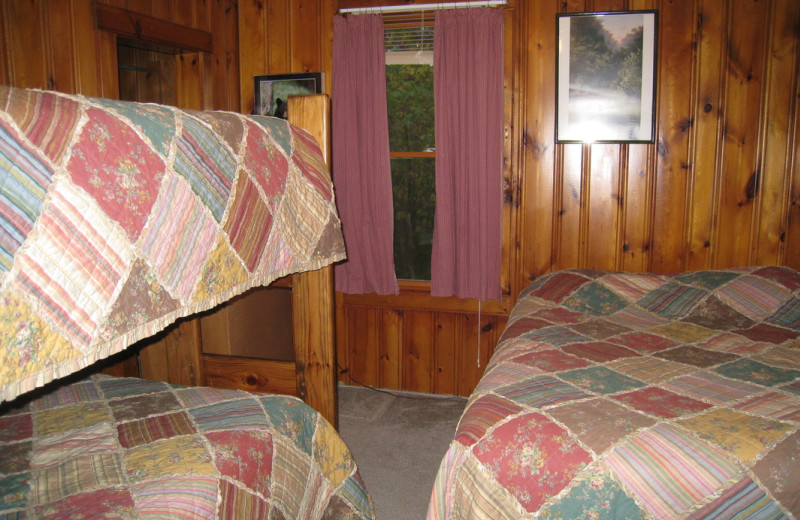 Cabin bedroom at Pine Tree Cove Resort.