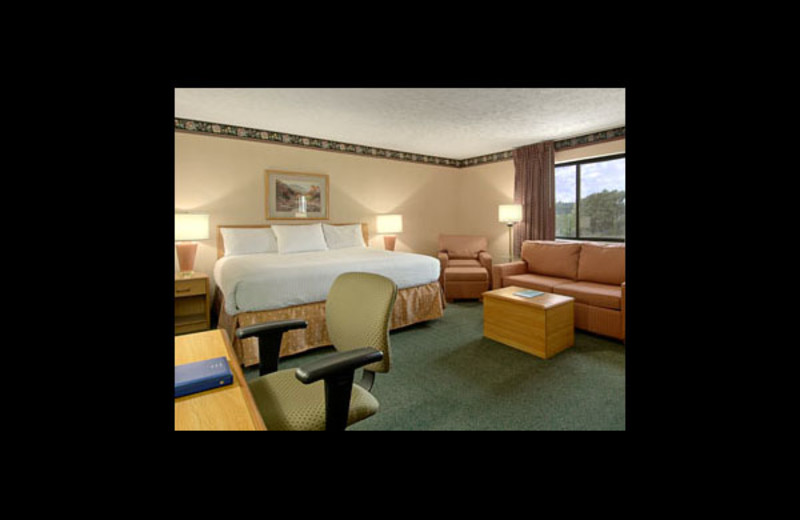 Guest room at Baymont InnSuites Traverse City.