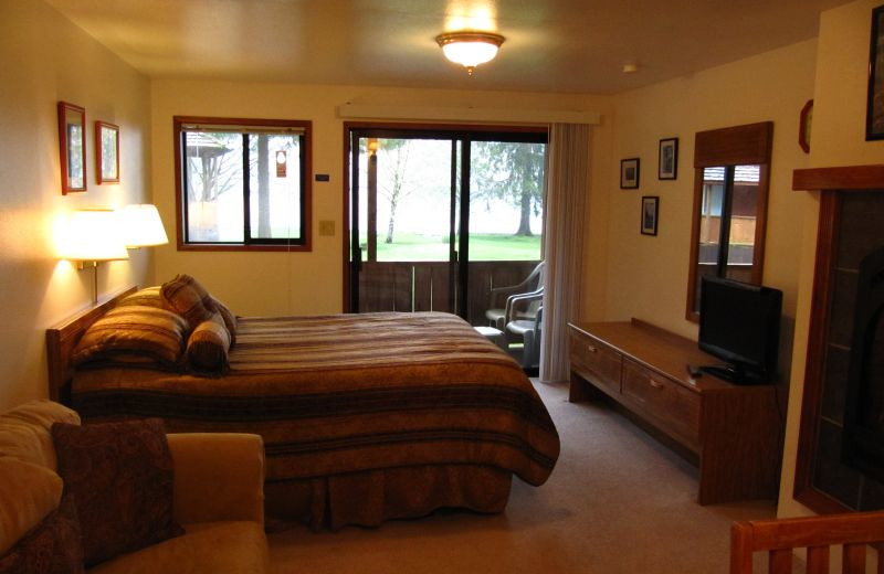 Cabin bedroom at Rain Forest Resort Village.