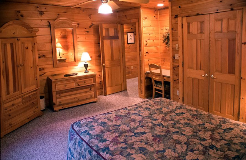 Cabin bedroom at Mountain Springs Lake Resort.