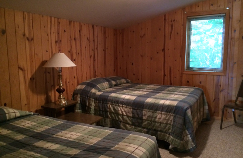 Cabin bedroom at Arnesen's Rocky Point Resort.