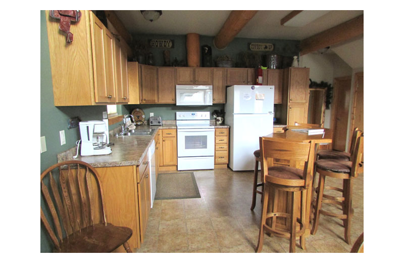 Rental kitchen at Heart of the Hills Vacation Homes.