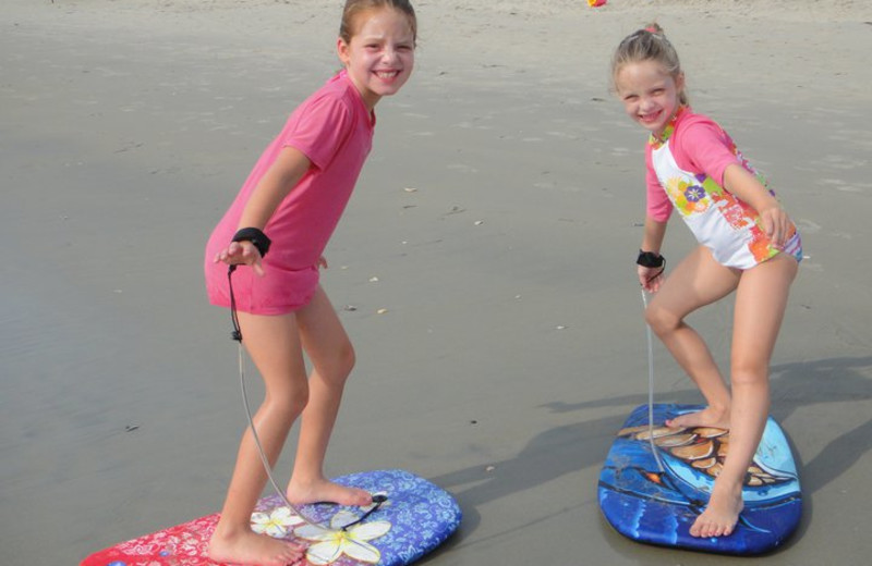 Kids at beach at Ramada Plaza.