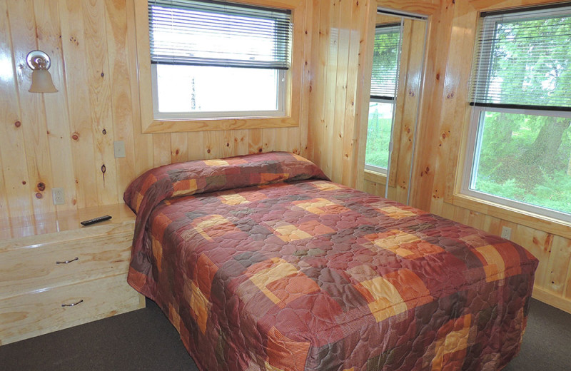 Cottage bedroom at Angel Rock Waterfront Cottages.