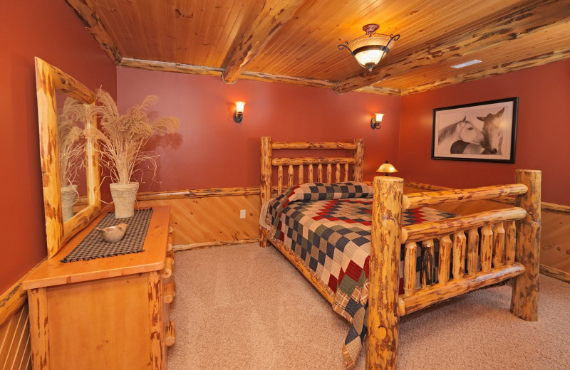 Guest bedroom at Sojourner's Lodge & Log Cabin Suites.