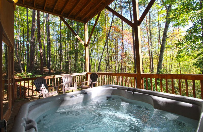 Rental hot tub at Hidden Creek Cabins.