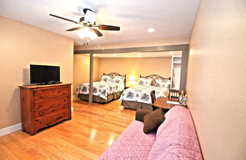 Guest room at Peach Tree Inn & Suites.