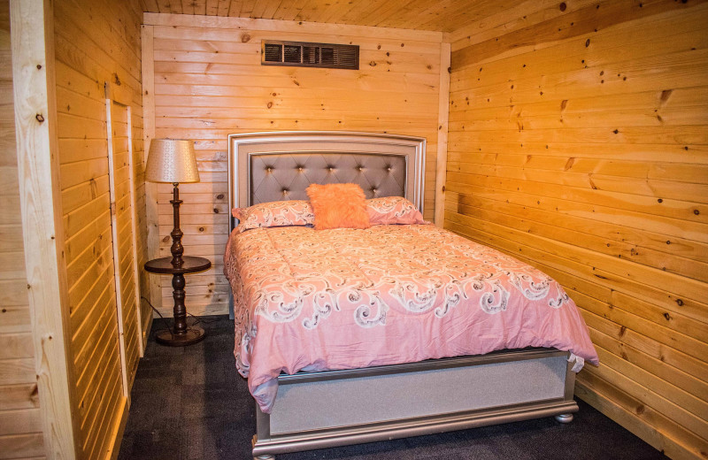 Cabin bedroom at Hocking Hills Cozy Cabins.