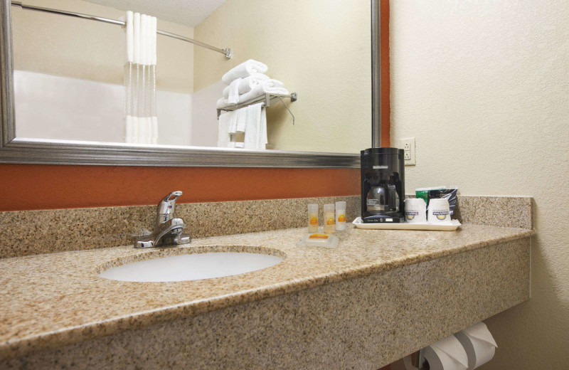 Guest bathroom at Days Inn & Suites - Benton Harbor.