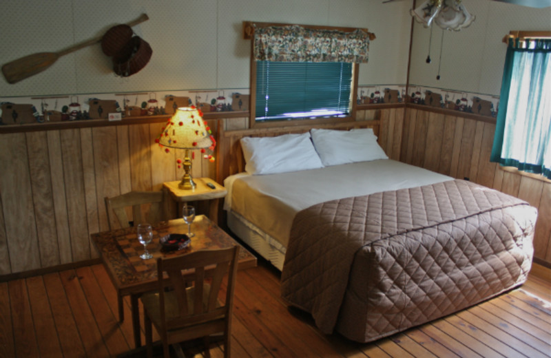 Cabin bedroom at Lindsey's Rainbow Resort.