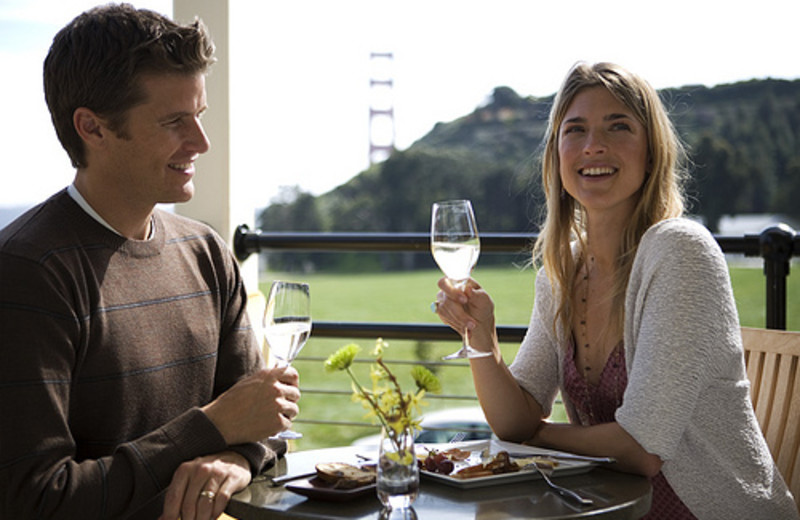 Couple dining outside at Cavallo Point Lodge.