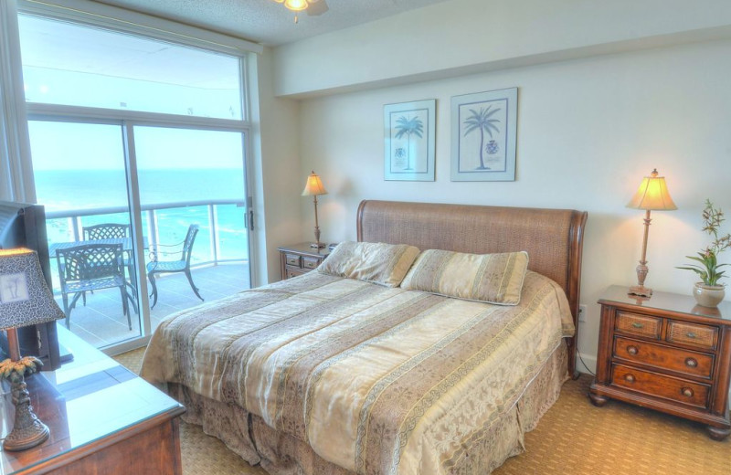 Rental bedroom at CondoLux Vacation Rentals.