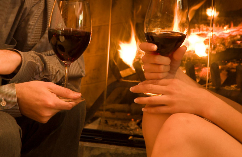 Couple tasting wine at Cottage Grove Inn.