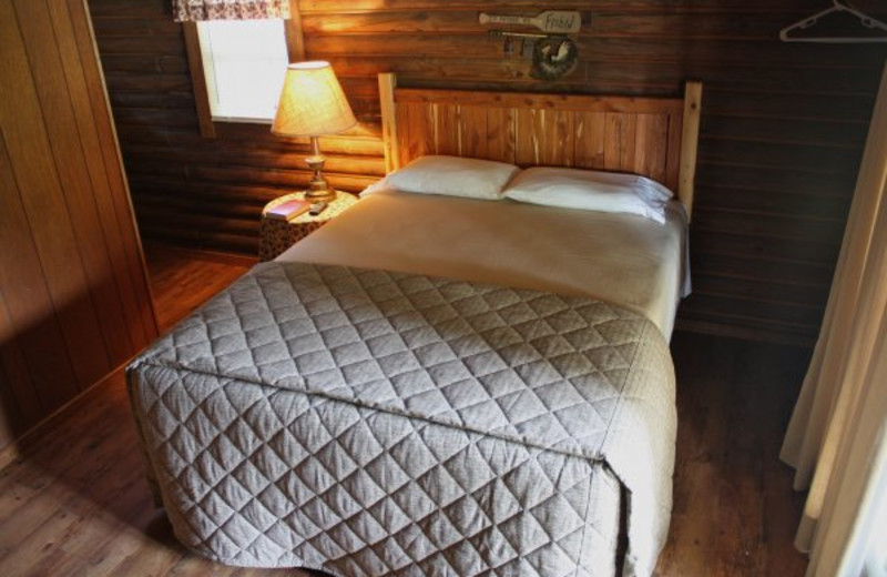 Cabin bedroom at Lindsey's Rainbow Resort.