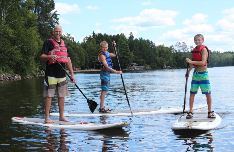 Paddle board at YMCA Camp Du Nord.