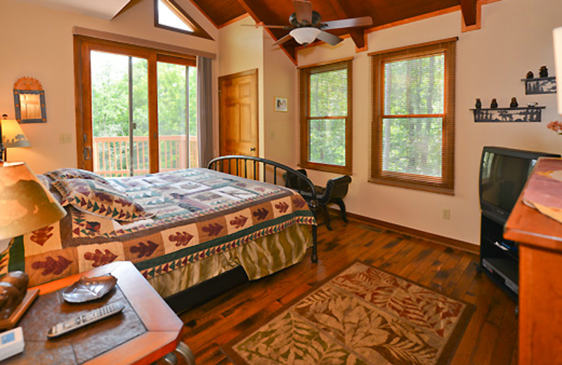 Cabin bedroom at Black Bear Resort Rentals.