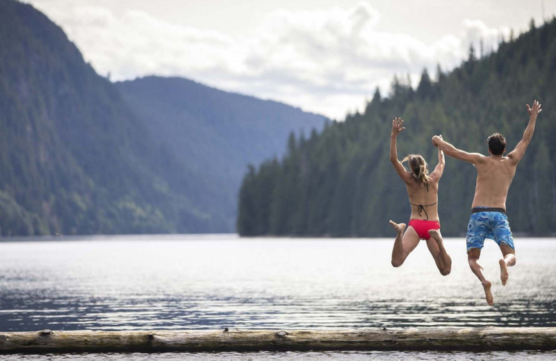 Jumping in lake at Sonora Resort and Conference Centre, Canada.