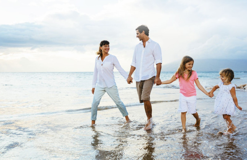 Family on beach at North Beach Realty.