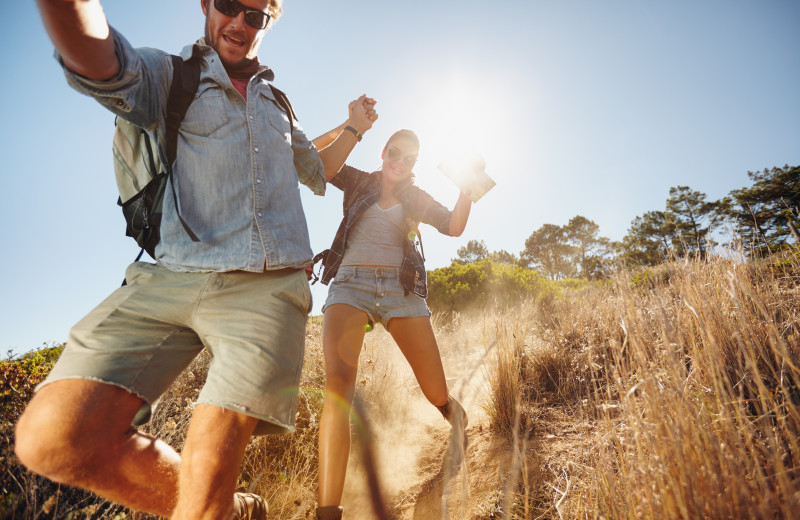 Couple hiking near Village Condominium.