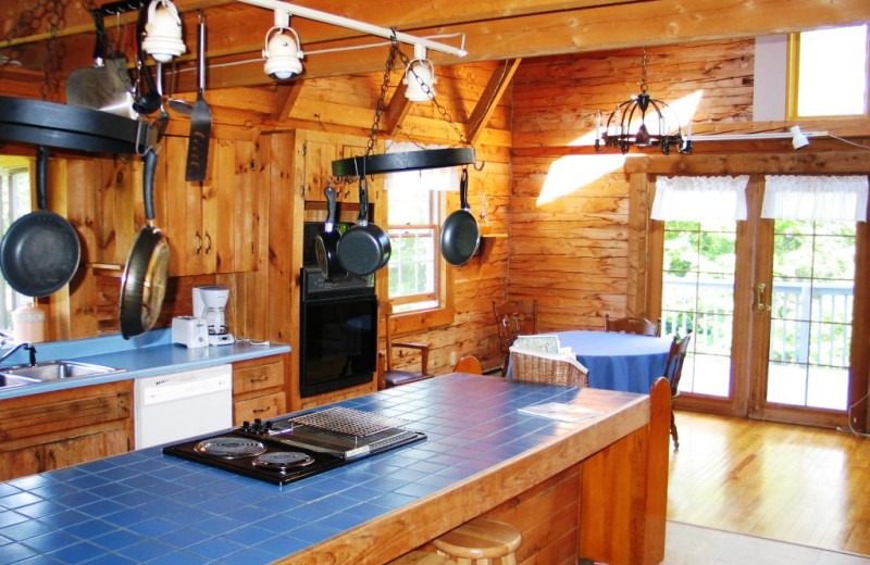 Rental kitchen at Franconia Notch Vacations Rental & Realty.