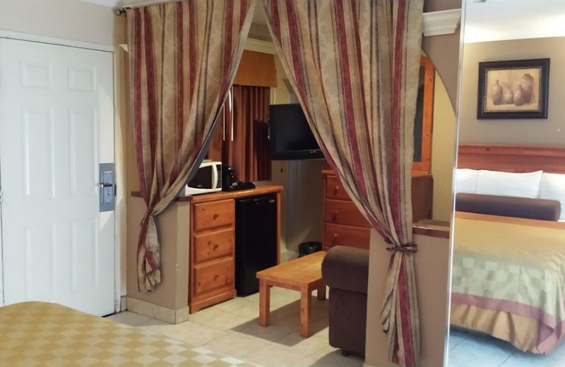 Guest room at Paradise Inn and Suites.