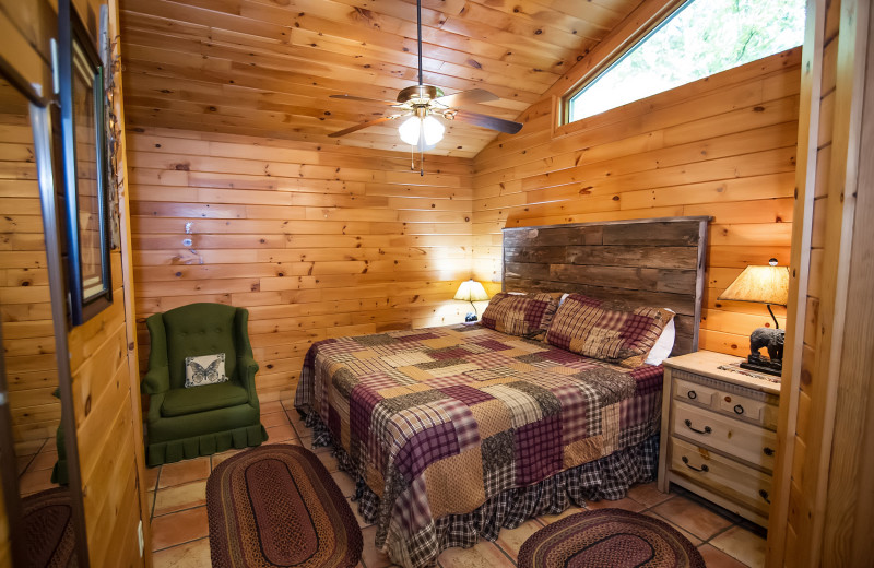 Cabin bedroom at Kiamichi Country Cabins.