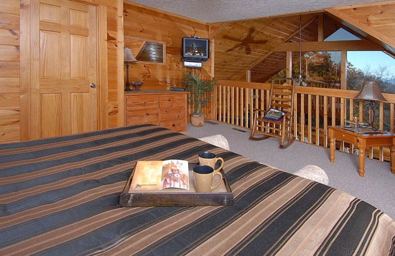 Cabin bedroom at Timber Tops Luxury Cabin Rentals.