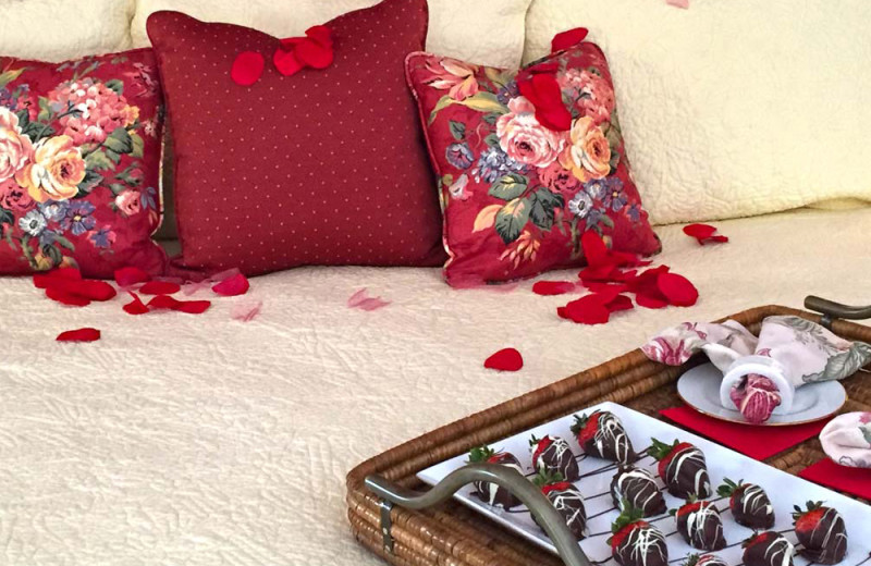Chocolates on bed at Birchwood Inn.