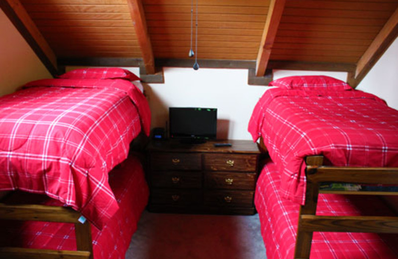 Vacation rental bedroom at Black Bear Resort.