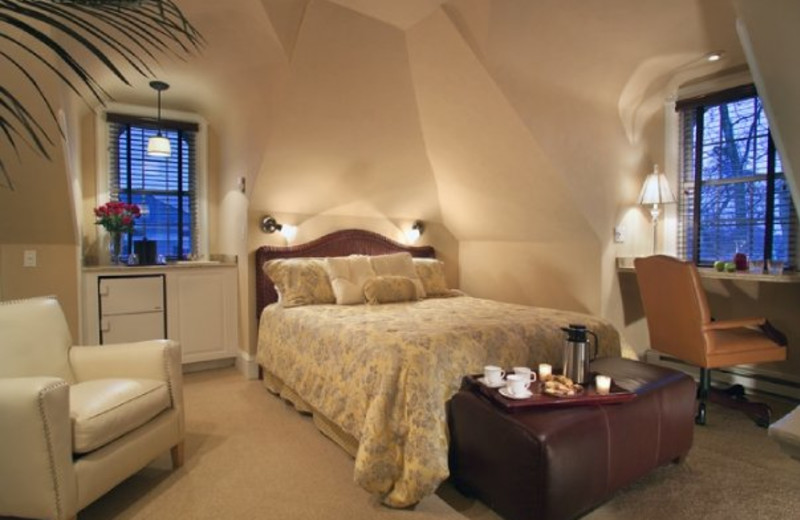 Guest room at The Chateau Inn & Suites.
