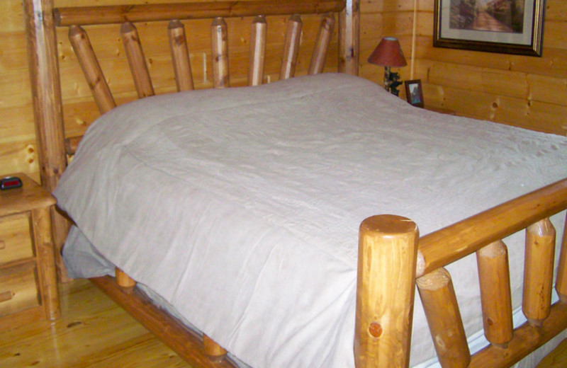 Cabin bedroom at White Oak Lodge & Resort.