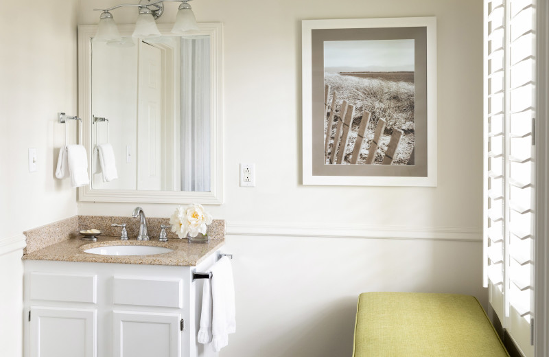 Guest bathroom at Vineyard Square Hotel & Suites.