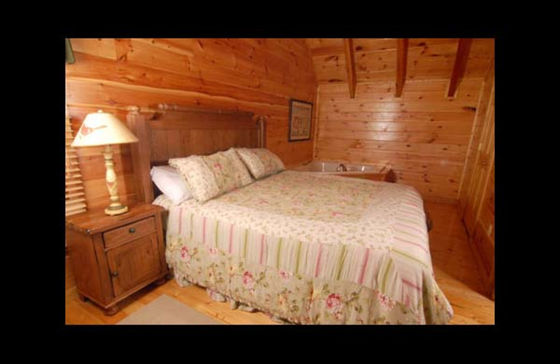 Cabin bedroom at Eden Crest Vacation Rentals, Inc. - Ostentatious Cabin Rental.