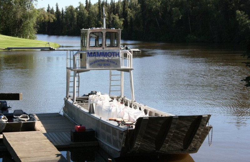 Boat on river at Northwoods Lodge.