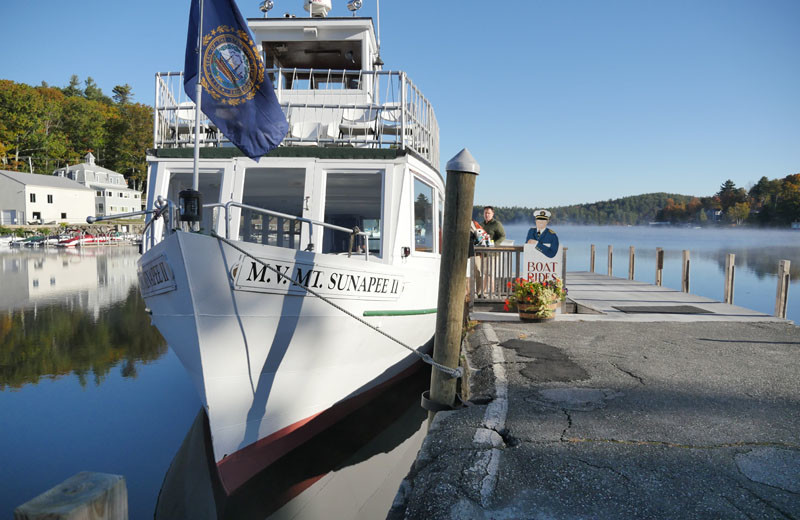 Boat at Sunapee Harbor Cottages.