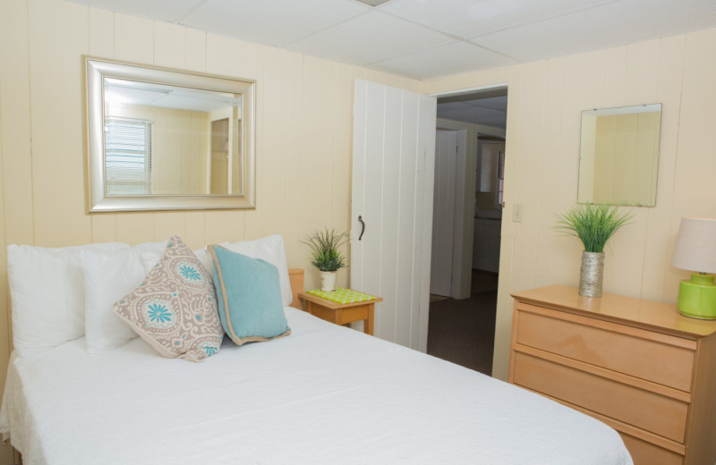 Cottage bedroom at Naswa Resort.