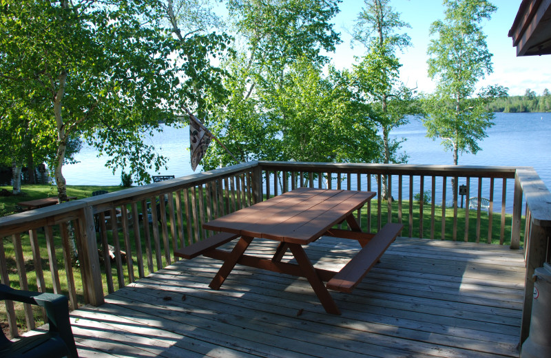 Deck with picnic table at River Point Resort & Outfitting Co.