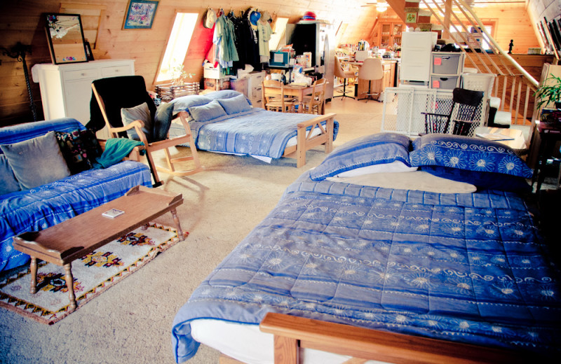 Cabin bedroom at Tri Lake Timbers Resort.