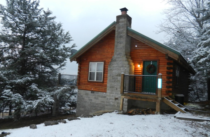 Cabin in winter at Whispering Hills Cabins.