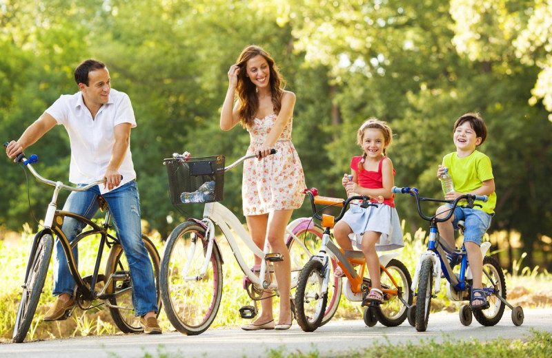 Family biking at Villas of Grand Cypress.