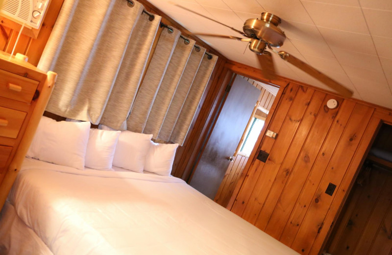 Cabin bedroom at Ruttger's Bay Lake Lodge.