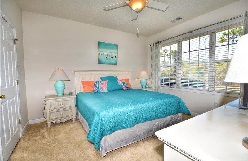 Rental bedroom at Barefoot Resort Rentals.