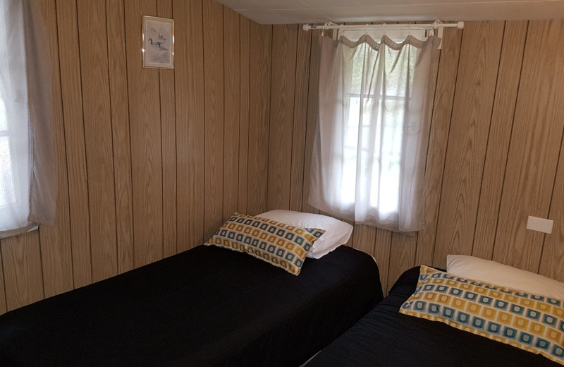 Cottage bedroom at Parkway Cottage Resort & Trading Post.