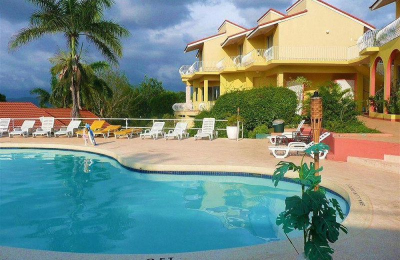 Outdoor pool at Caribbean Sunset Resort.